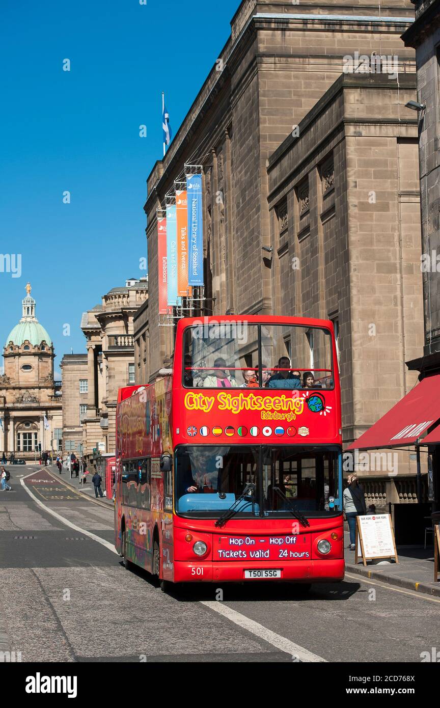 Open top tour bus in city of Edinburgh, Scotland. Stock Photo