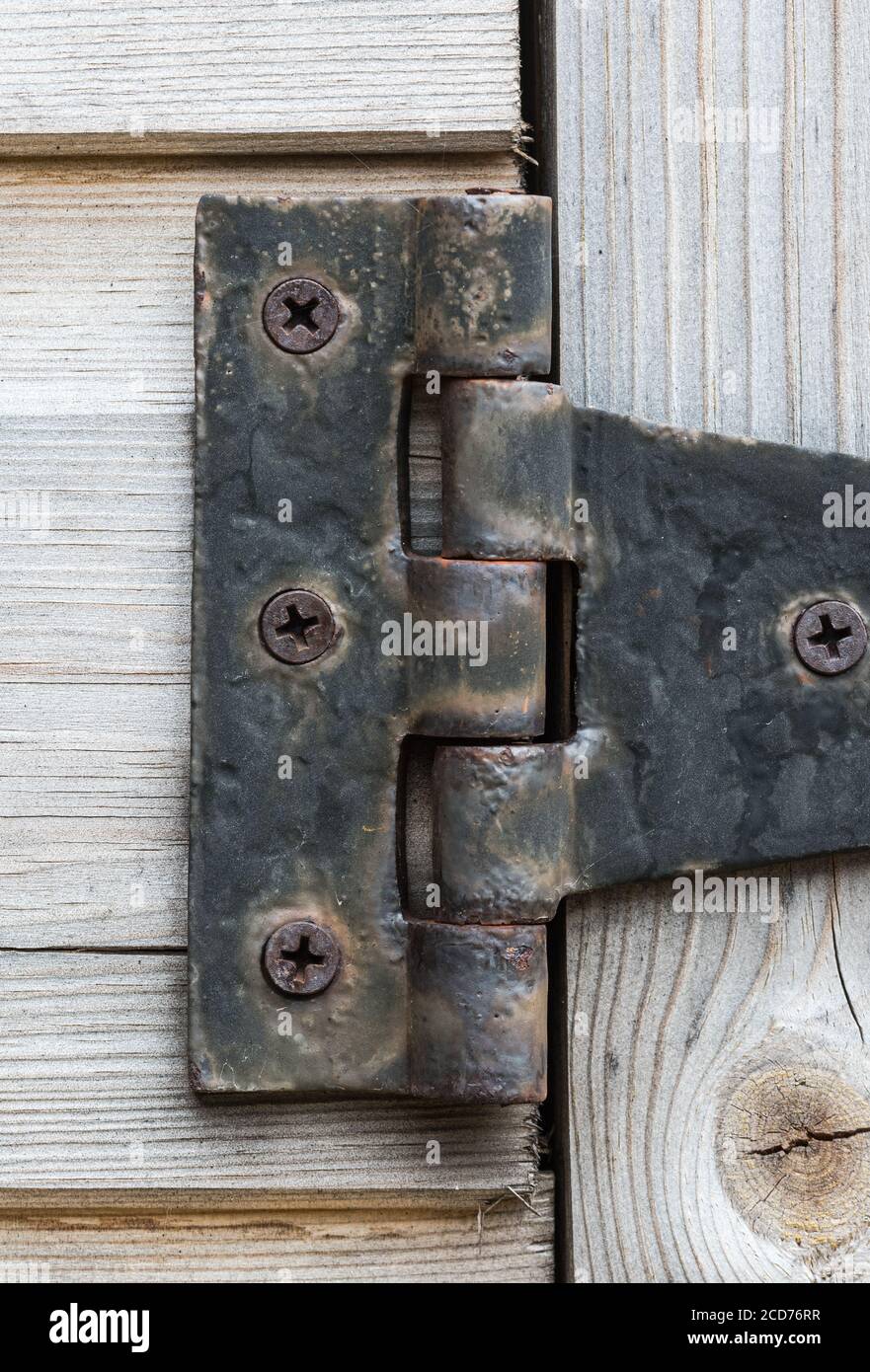Old large hinge on an outdoor shed door Stock Photo Alamy