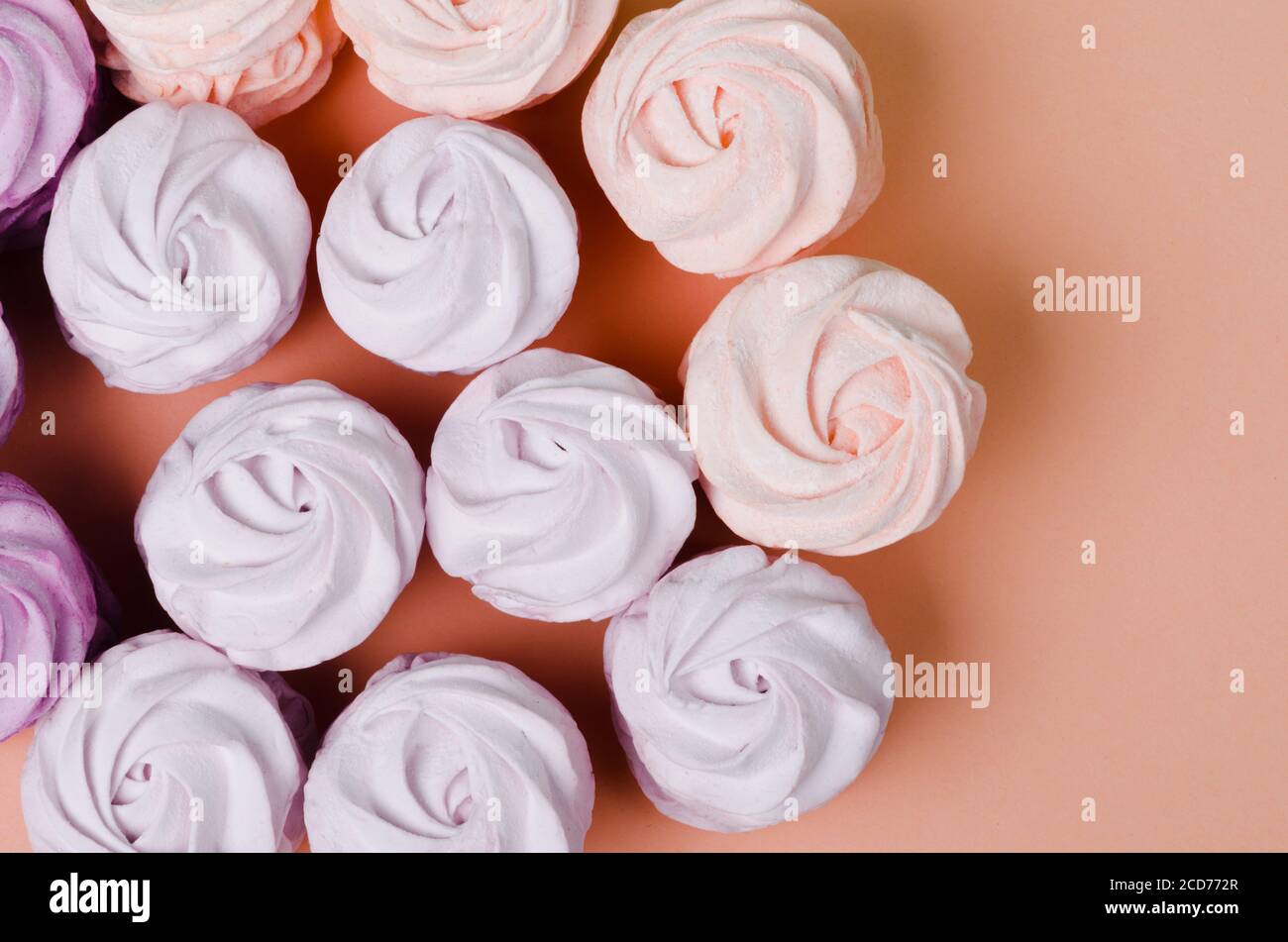 Marshmallows on pastel yellow background. Flat lay. Top view Stock Photo
