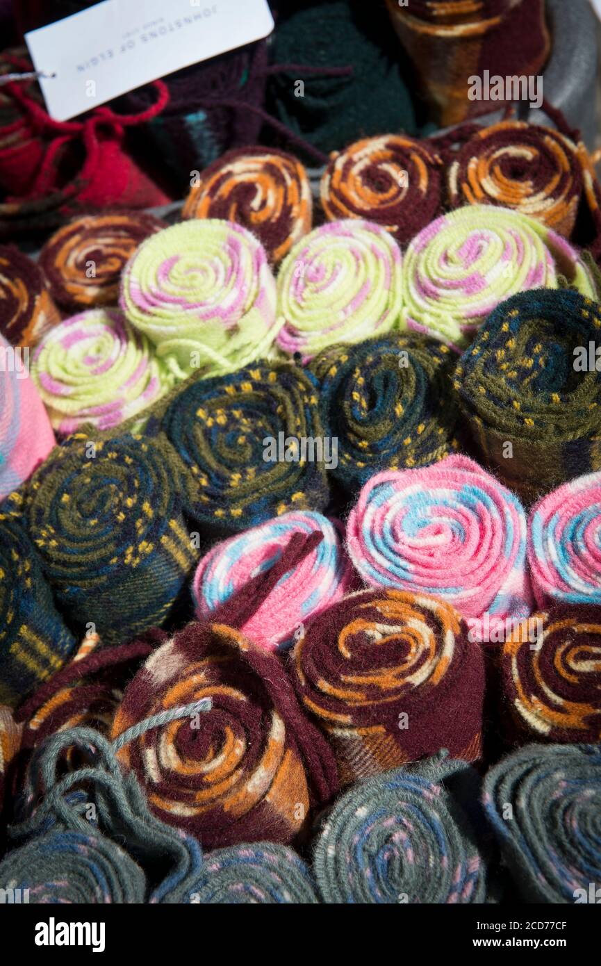 Basket of scarves for sale outside a shop in Edinburgh, Scotland. Stock Photo