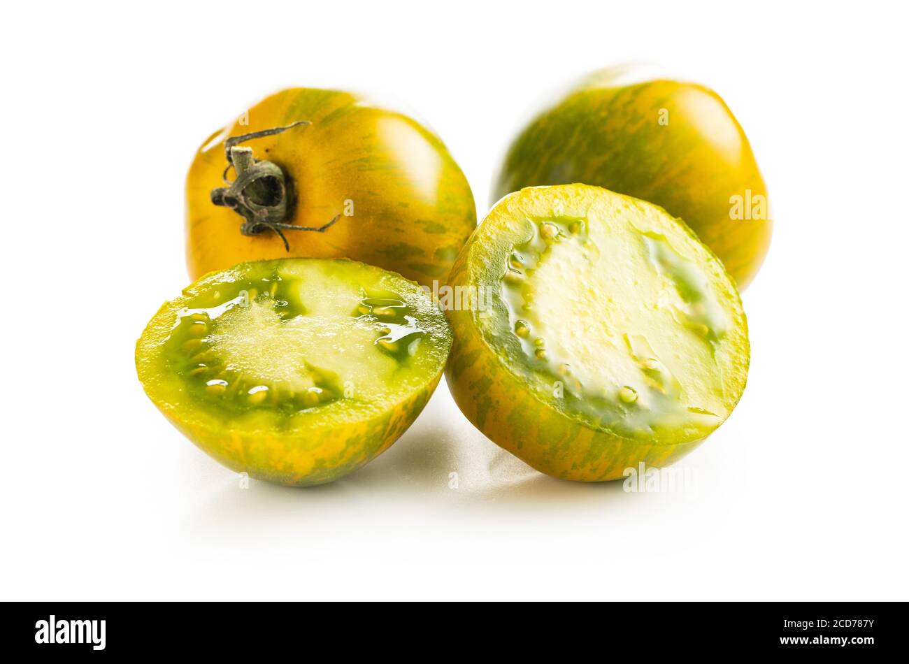 Green zebra tomatoes isolated on white background. Stock Photo