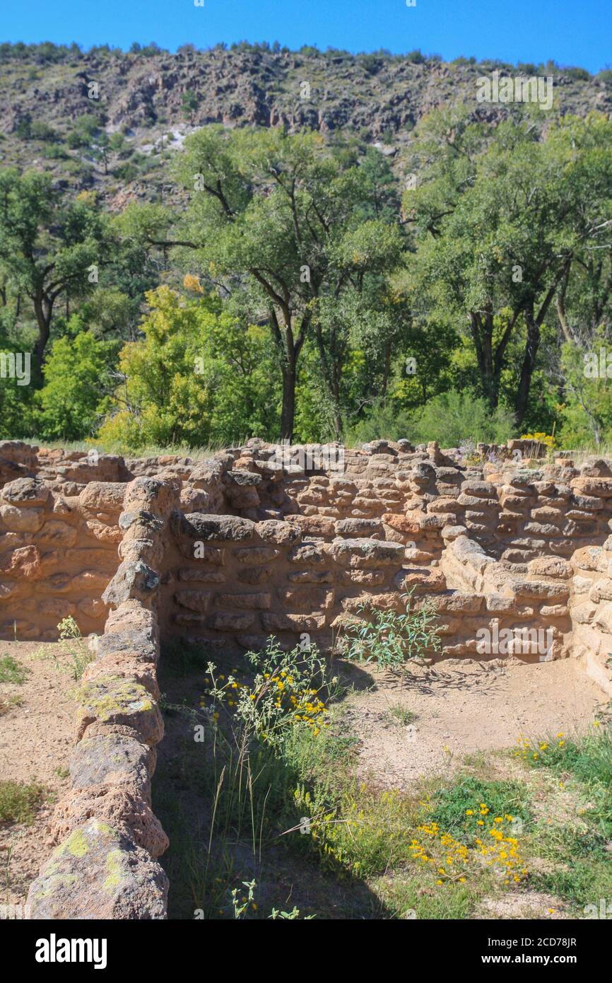 Ruins of kiva wall built by Native American Pueblo people with blocks made from volcanic rock canyon. Bandelier National Monument, New Mexico, USA Stock Photo