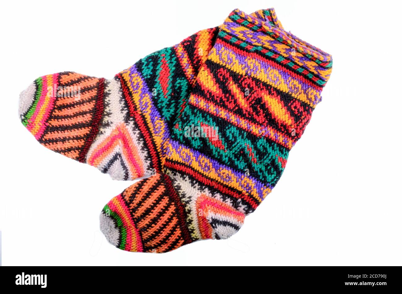 Multi-colored knitted woolen socks isolated on white background Stock Photo