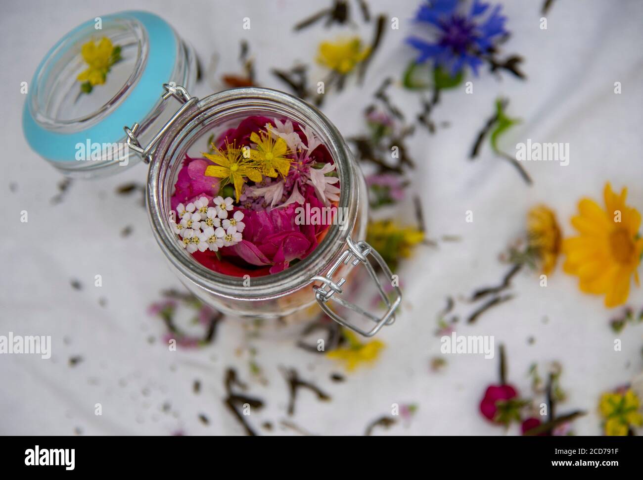 Fresh aromatic medicinal herbs in a glass container Stock Photo Alamy