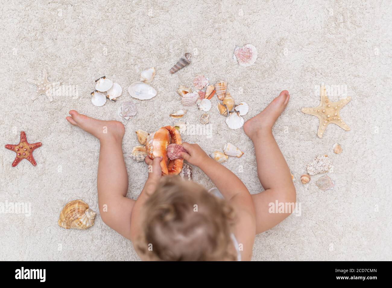 Conch shell listening High Resolution Stock Photography and Images - Alamy