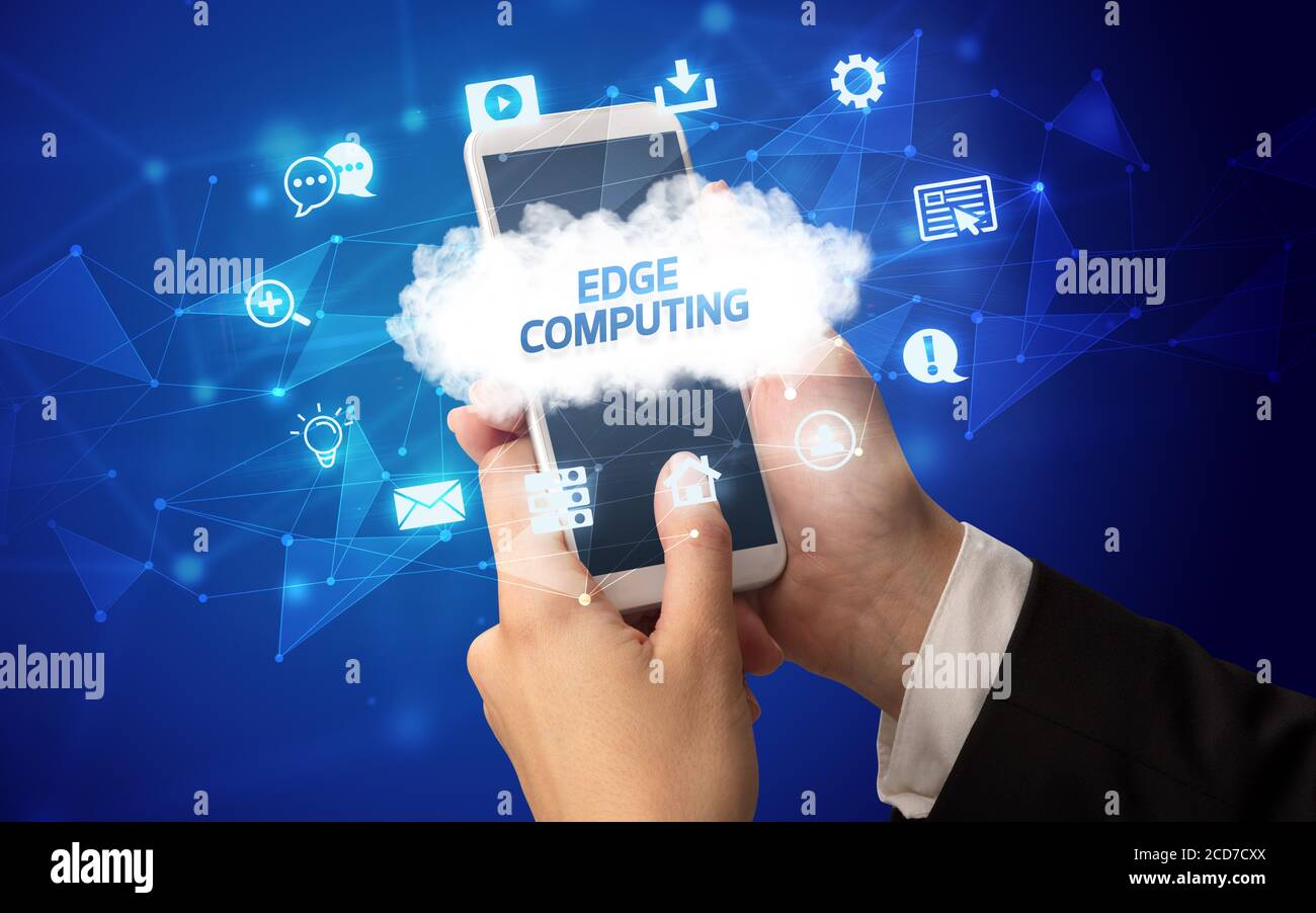 Female hand holding smartphone with EDGE COMPUTING inscription, cloud ...