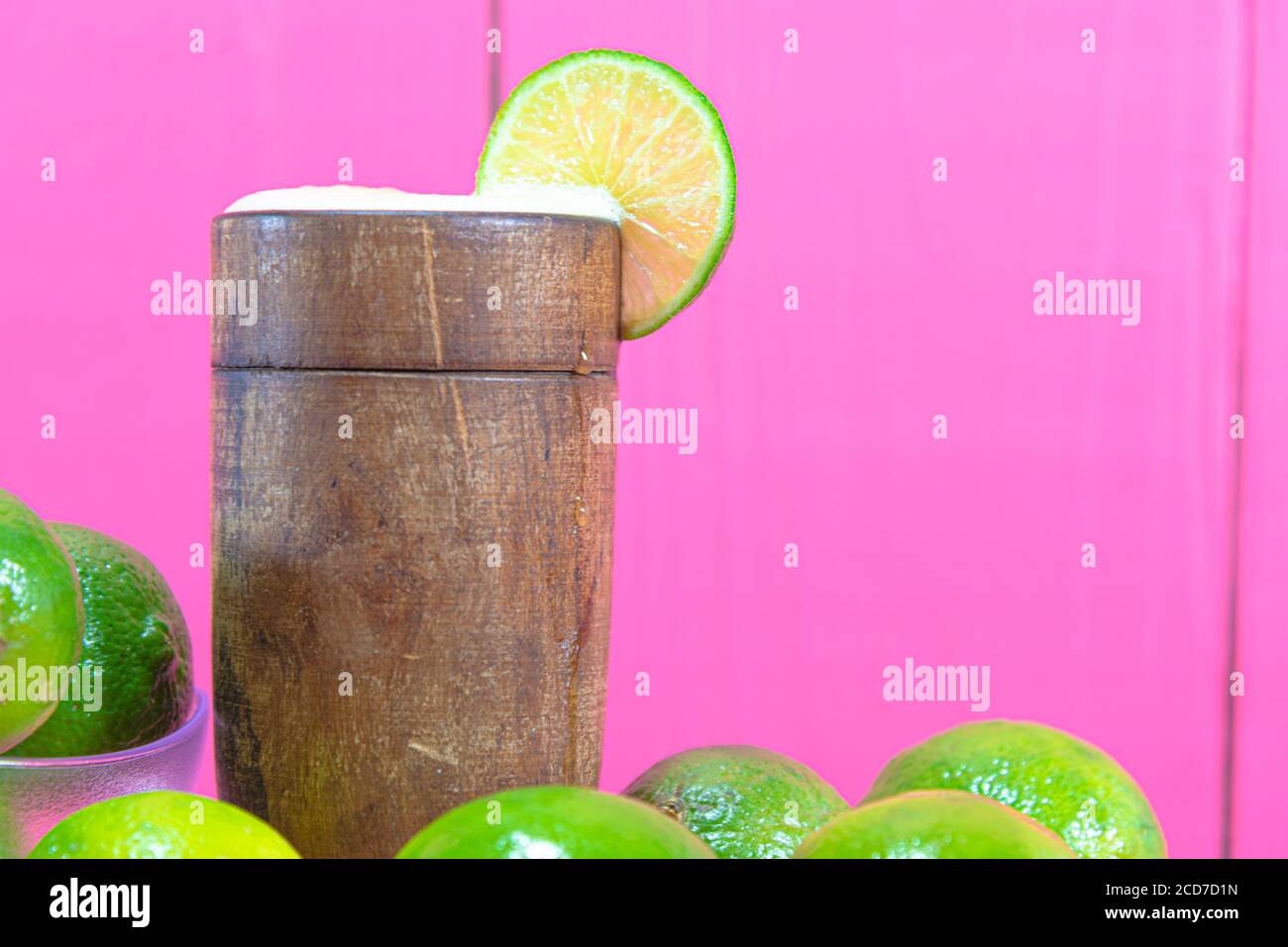 Lemon juice and fruits. Tahiti lemon (Citrus × latifolia). Citrus drink