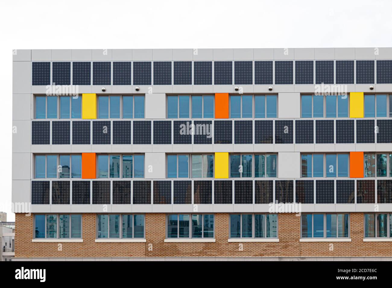 Building solar panels. Solar elementary school building. Eco-friendly school building. Stock Photo