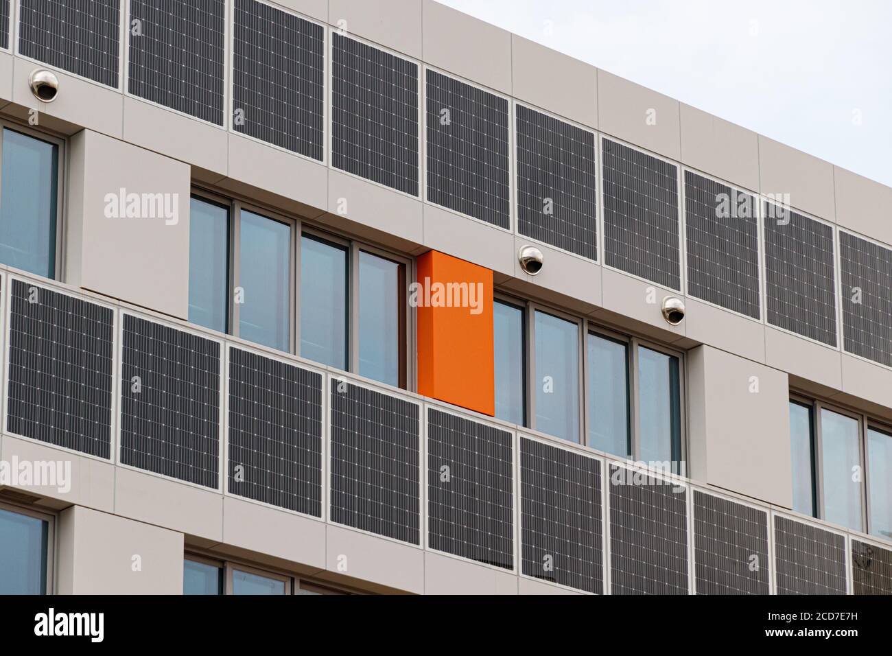 Building solar panels. Solar elementary school building. Eco-friendly school building. Stock Photo