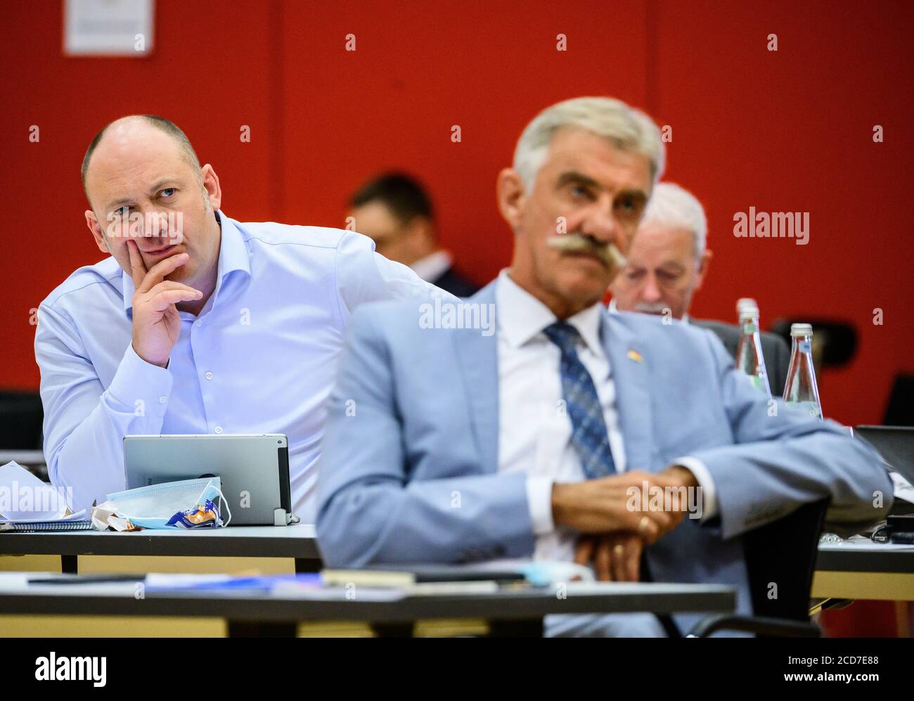 Mainz, Germany. 27th Aug, 2020. Joachim Paul (l, AfD), deputy leader of his party in Rhineland-Palatinate, sits in the state parliament behind Uwe Junge (r, AfD), leader of his party in Rhineland-Palatinate. Plenary session in the state parliament of Rhineland-Palatinate, including the adoption of a supplementary budget. Credit: Andreas Arnold/dpa/Alamy Live News Stock Photo