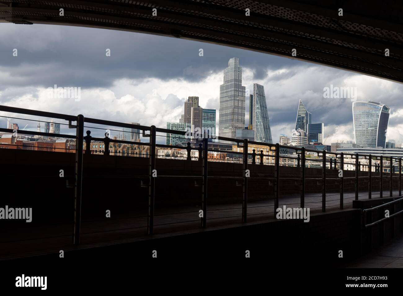 View of skyscrapers in the City of London seen from the Thames Path. Stock Photo