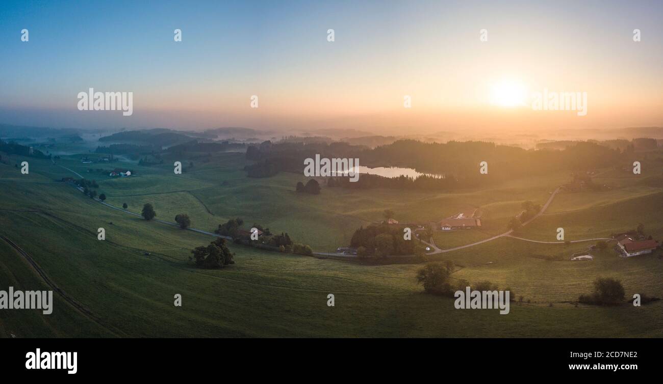 Misty autumn morning in Unterallgäu - sunrise with mystical landscape Stock Photo