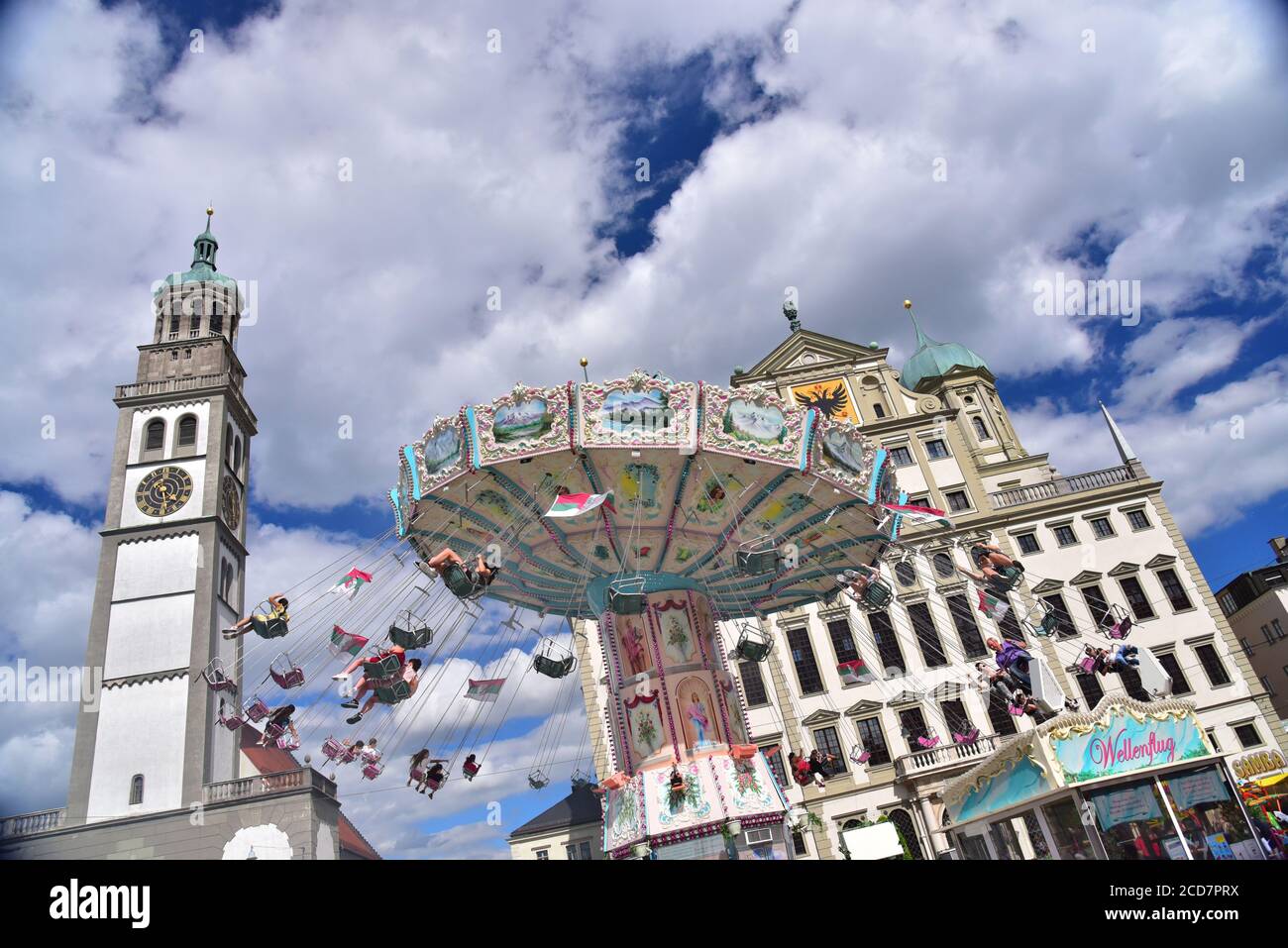 Chain carousel on the Augsburg town hall square in front of the town hall and the Perlach tower, Augsburg, Swabia, Bavaria, Germany, Europe Stock Photo