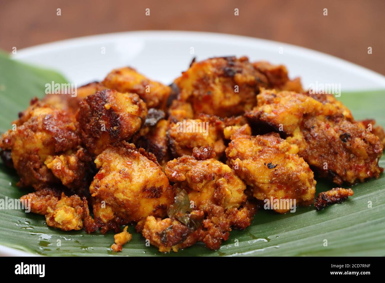 Kundapur or Malabar Paneer ghee roast, Mangalorean style, South Indian traditional food, cottage cheese roasted in butter and spices Stock Photo