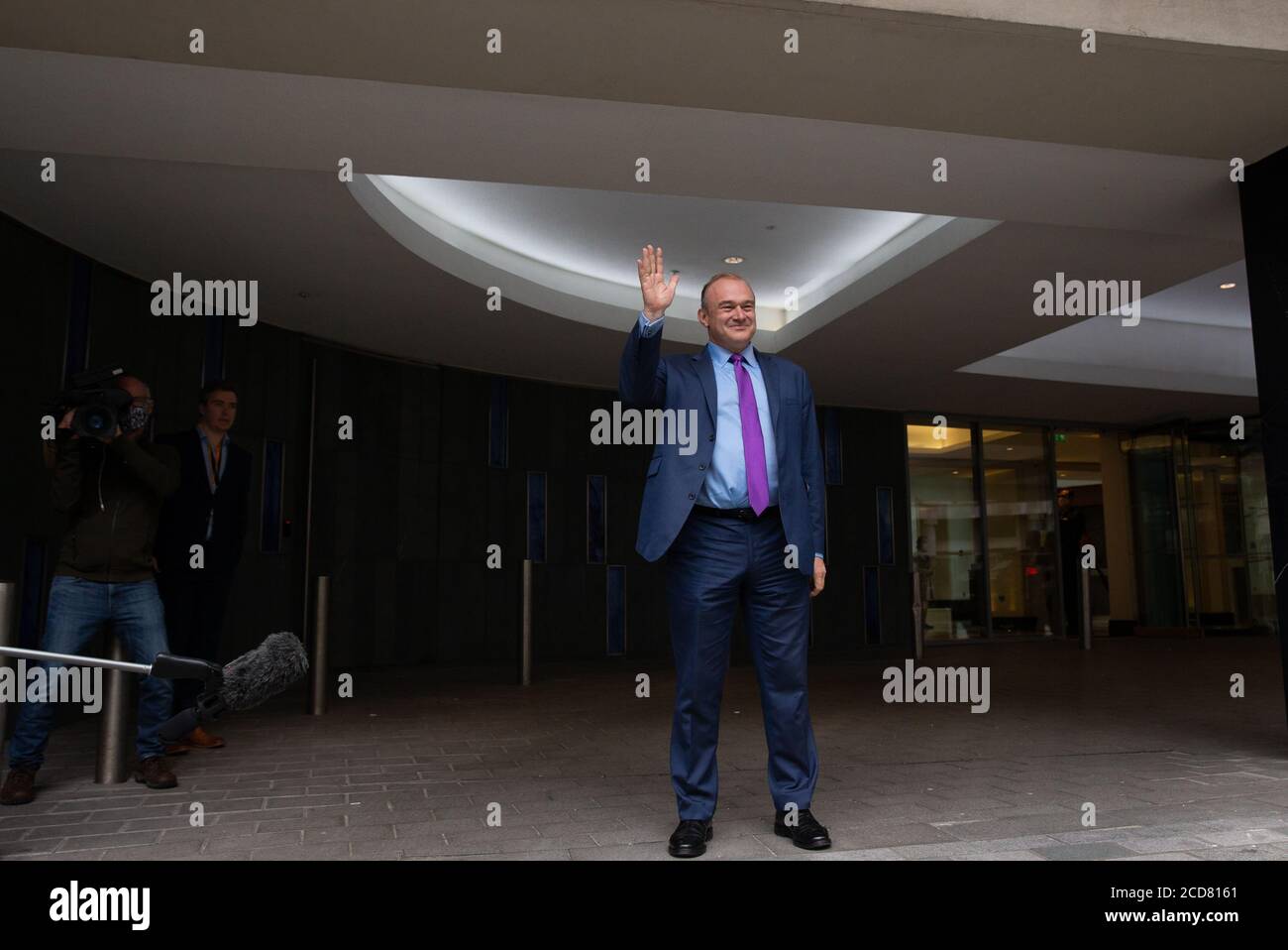 London, UK. 27th Aug, 2020. Sir Ed Davey waves after he was elected as the new Leader. Sir Ed Davey is elected leader of the Liberal Democrat party. He secured 63.5% of the votes beating fellow competitor Layla Moran. Liberal Democrat Leadership candidate result. Credit: Tommy London/Alamy Live News Stock Photo