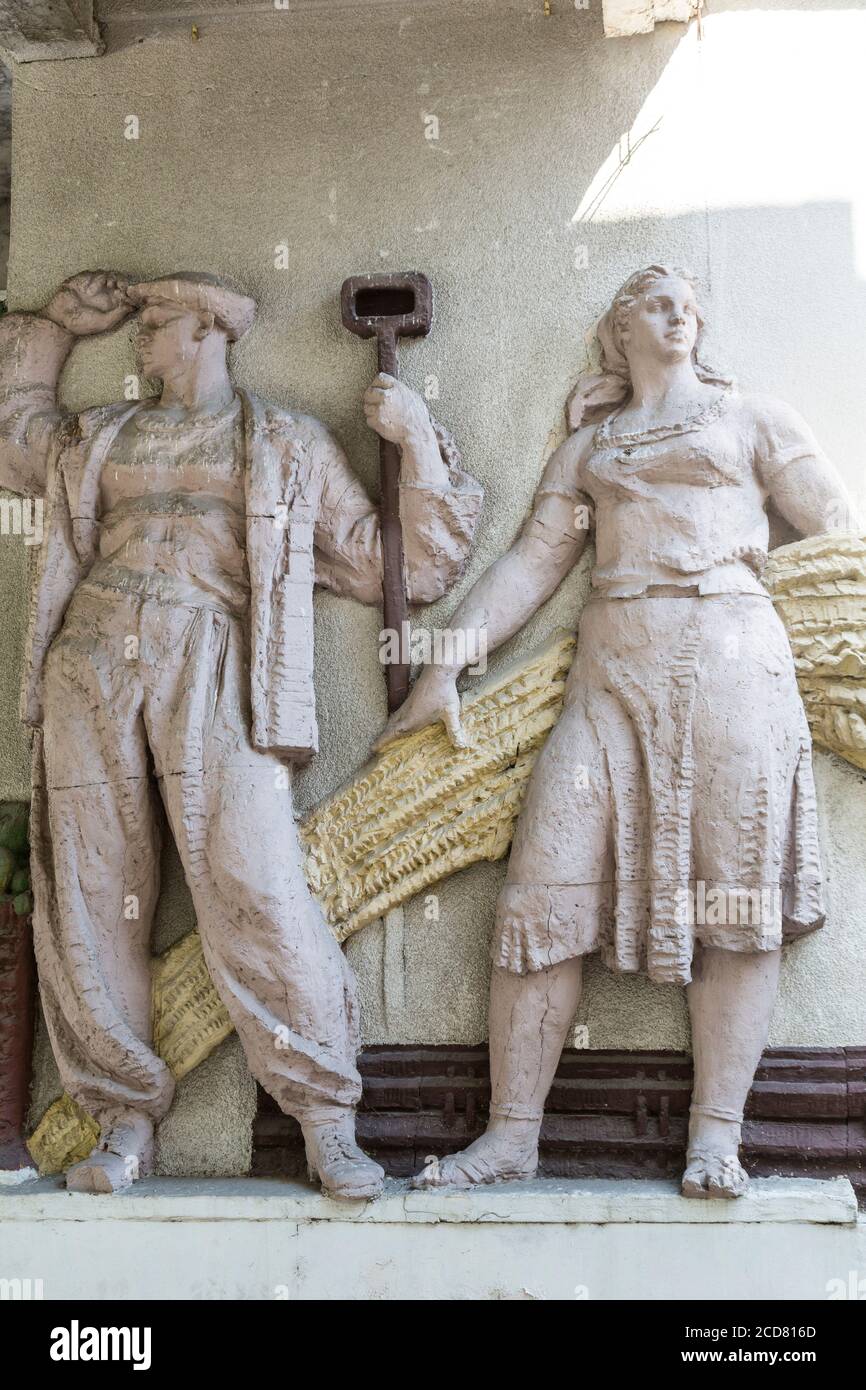 Worker and peasant relief on the buliding Stock Photo