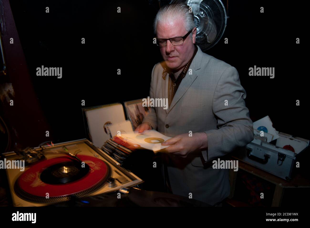 DJ Chico Malo on Technics 1210 decks and Pioneer sound mixer console, Smokestack Club, Leeds, West Yorkshire UK 2017 Stock Photo