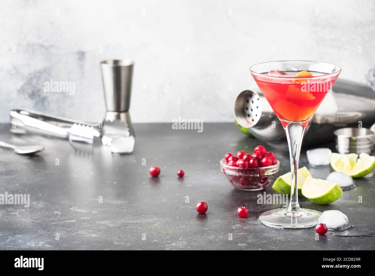 Classic alcoholic cocktail cosmopolitan with vodka, liqueur, cranberry