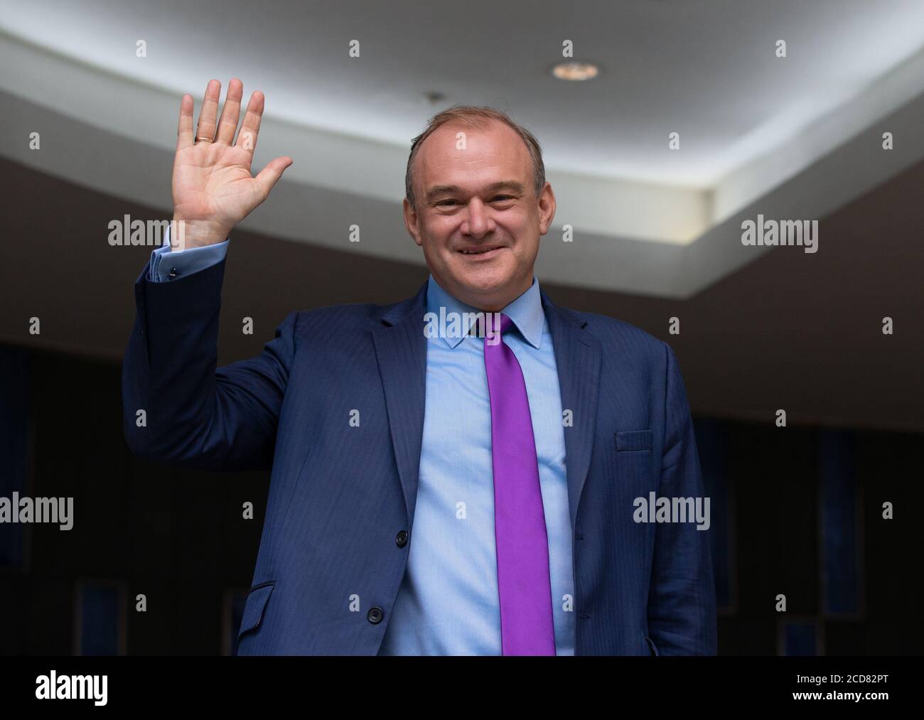 London, UK. 27th Aug, 2020. Sir Ed Davey waves after he was elected as the new Leader. Sir Ed Davey is elected leader of the Liberal Democrat party. He secured 63.5% of the votes beating fellow competitor Layla Moran. Liberal Democrat Leadership candidate result. Credit: Tommy London/Alamy Live News Stock Photo