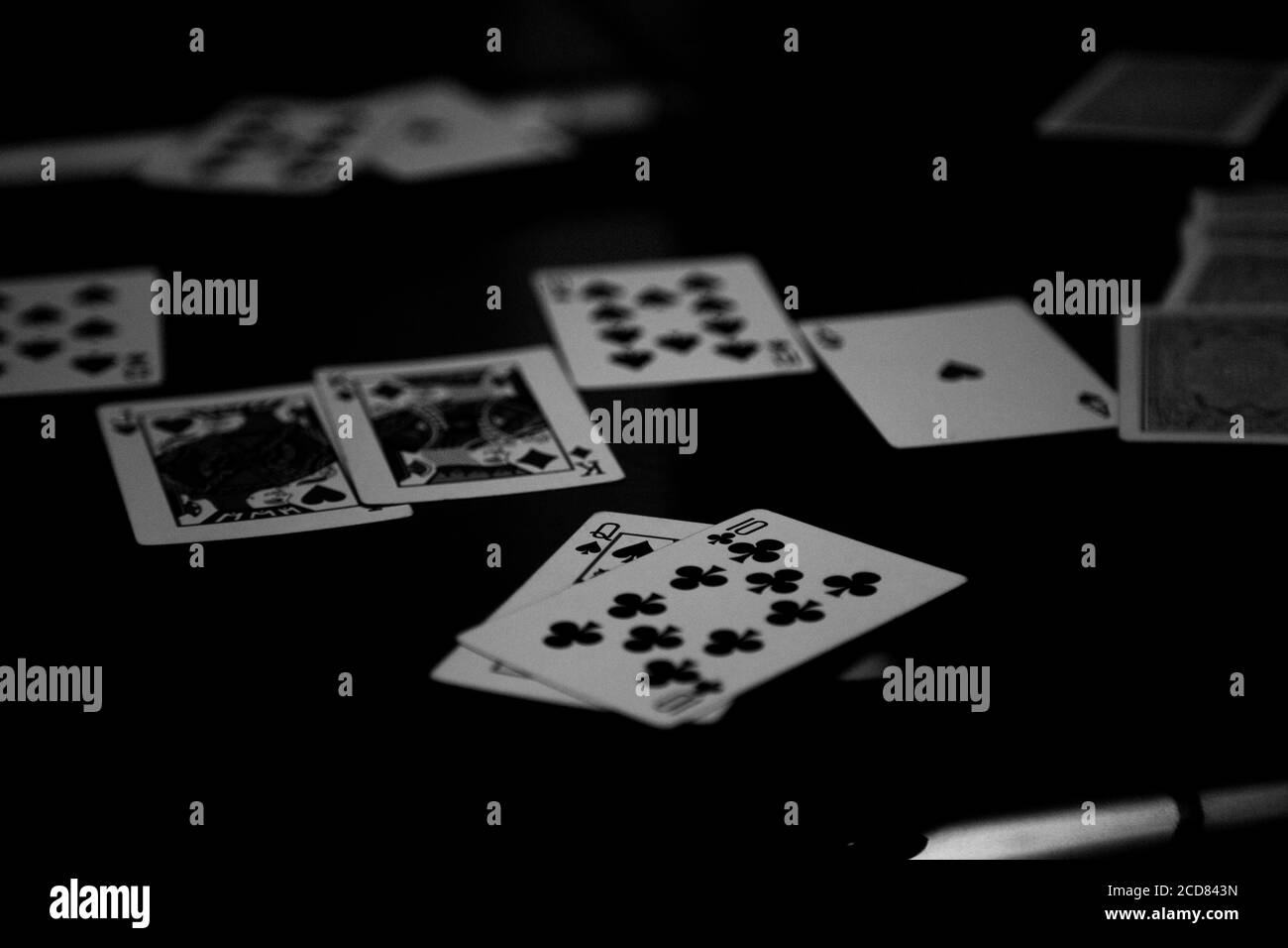 a poker game in black and white filte filter Stock Photo - Alamy