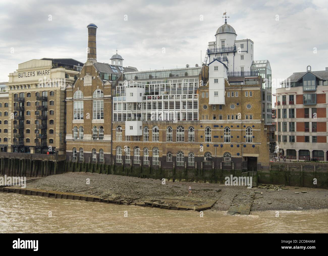 Butler's Wharf and the Anchor Brewhouse Horselydown on the riverbank of the River Thames. London Stock Photo