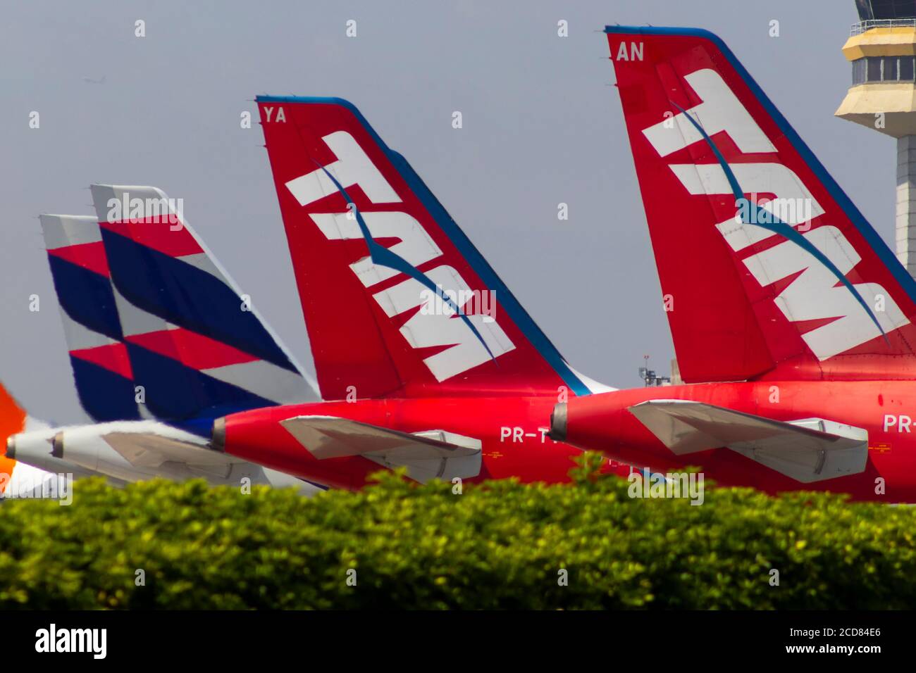 Aircraft tails LATAM AIrlines, som still using the old TAM logo, at  Congonhas AIrport in São Paulo, Brazil Stock Photo - Alamy