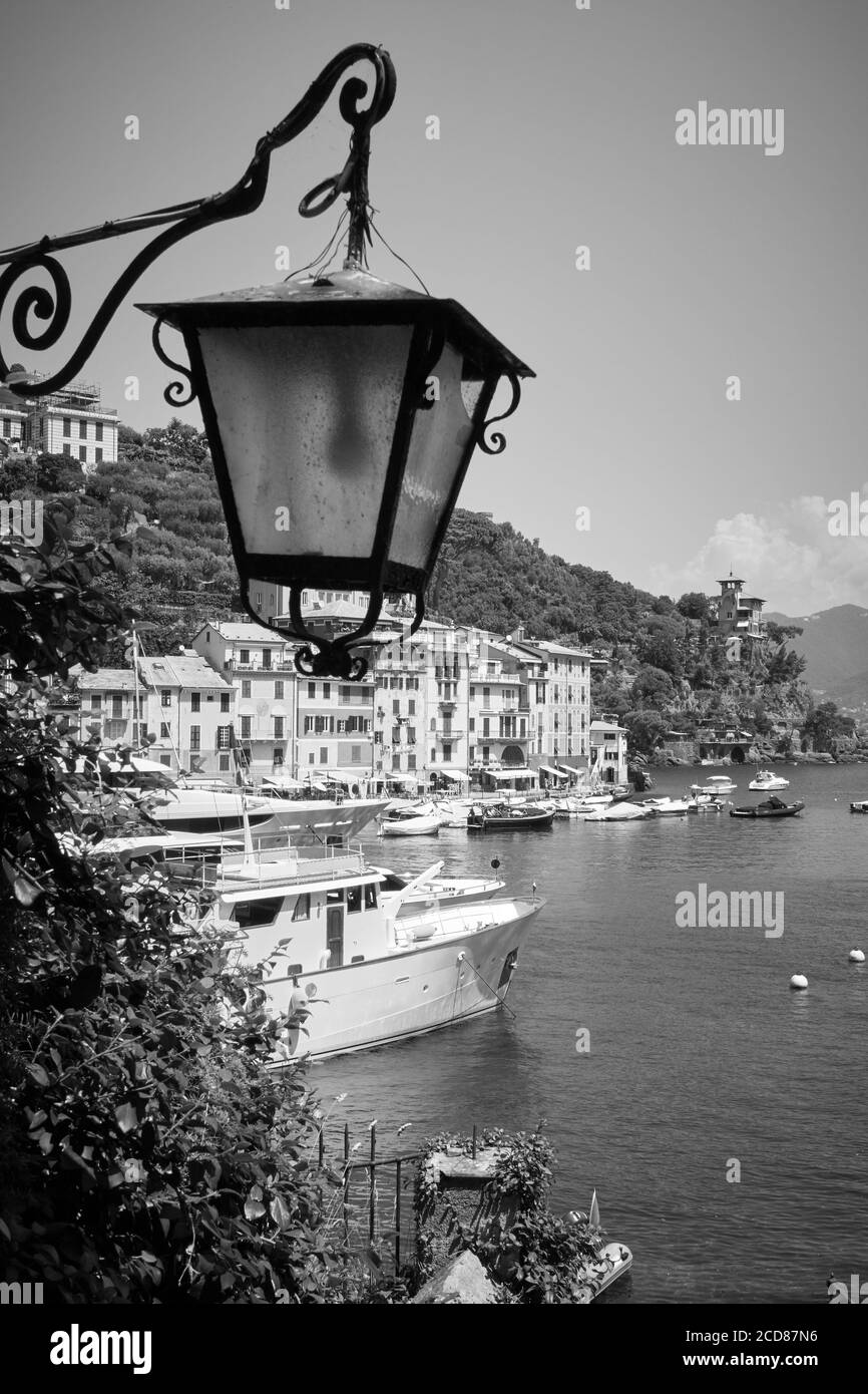 View of Portofino town with vintage street light, Italy. Black and white italian landscape Stock Photo