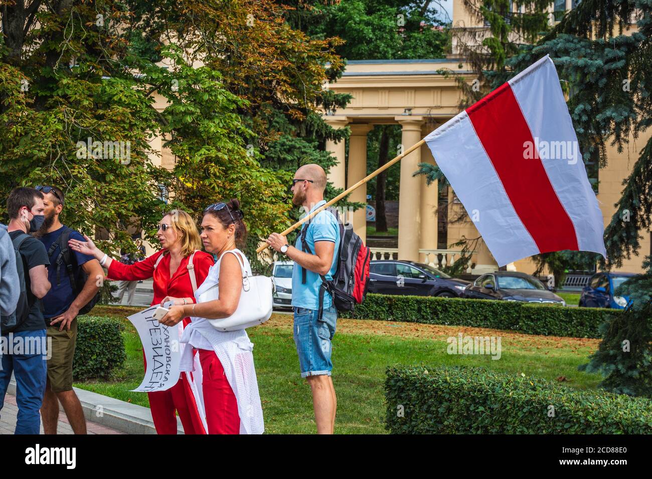 People holding flag during peaceful protests against stolen presidential elections in Minsk, Belarus. Minsk, Belarus - August 15 2020. Stock Photo
