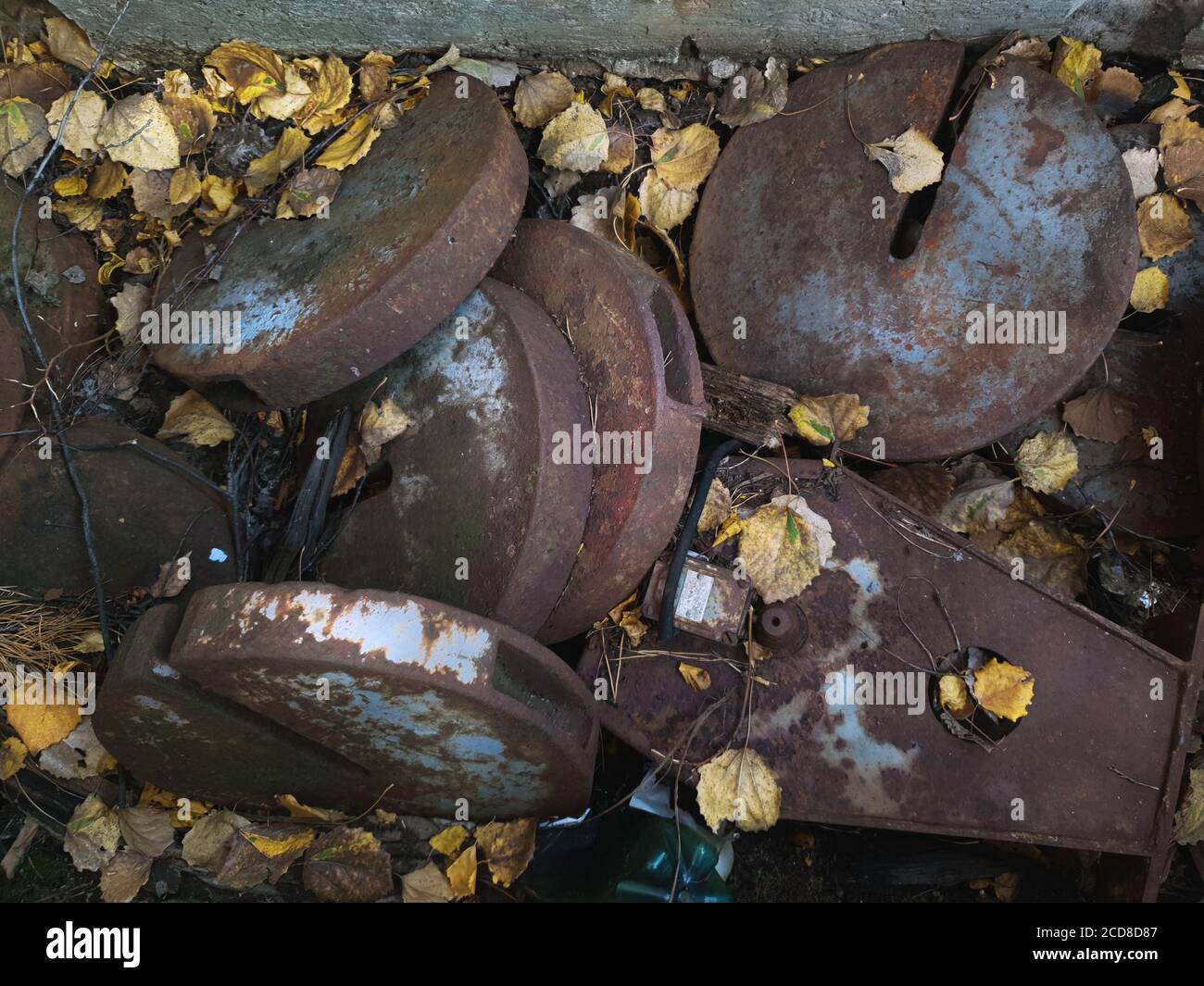 Rusty metal parts from radioactive vehicles in the city of Pripyat, Chernobyl exclusion zone, Ukraine Stock Photo