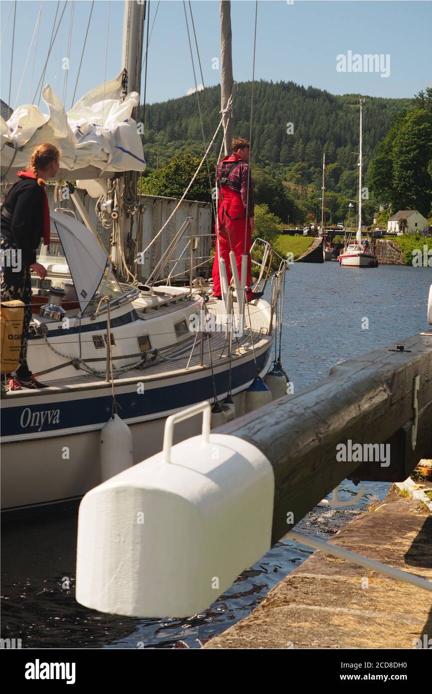 Yachts between locks five and six at Cairnbaan, Crinan Canal, Argyll, Scotland with the balance beam in view Stock Photo