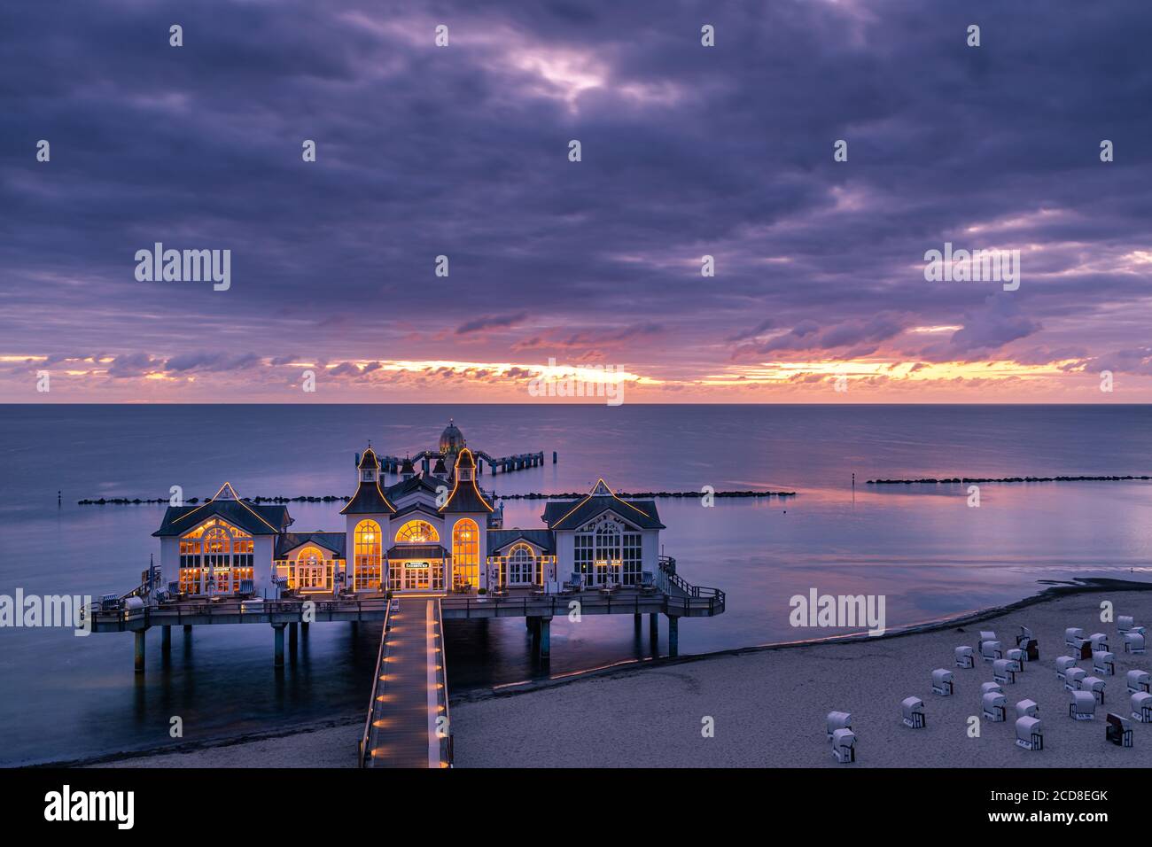 Sellin Pier (German: Seebrücke Sellin) is a pier in the Baltic seaside resort of Sellin on the German island of Rügen. The pier has a restaurant near Stock Photo