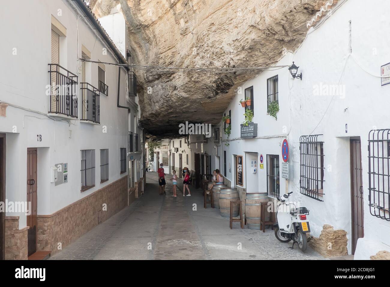 Andalucia in Spain: the pretty pueblo blanco of Setenil de las Bodegas and  it's famous houses and restaurants built into and sometimes under limstone  Stock Photo - Alamy