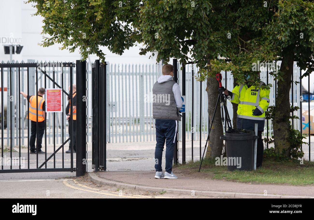 Temperature checks are carried out as staff enter Banham Poultry in Attleborough, Norfolk, where 75 poultry processing workers tested positive for coronavirus following tests on 347 members of staff. Stock Photo