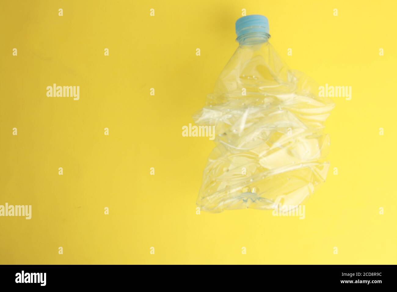 Empty plastic water bottle scaled for recycling Stock Photo