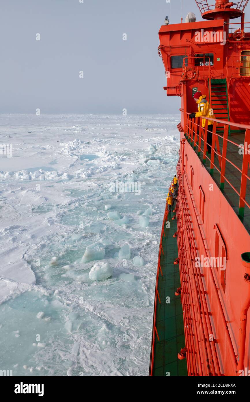 Russia, High Arctic. Crashing through thick sea ice at 89 degrees north heading for the North Pole. View from the deck of Russian icebreaker, 50 Years Stock Photo