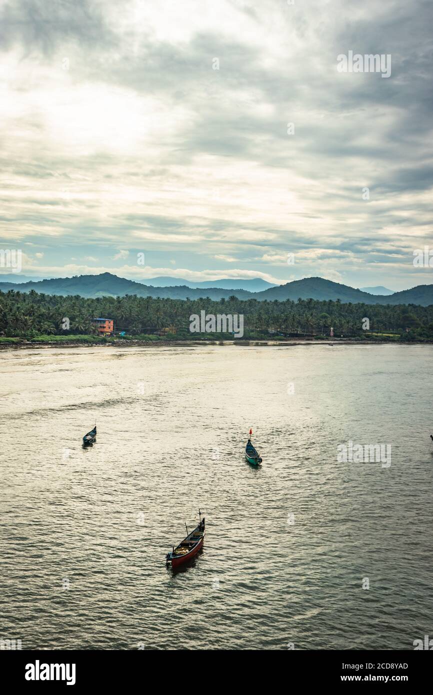 fishing boats in the sea aerial shots at early morning image is take at murdeshwar karnataka india at early morning. it is the very holy as well as to Stock Photo