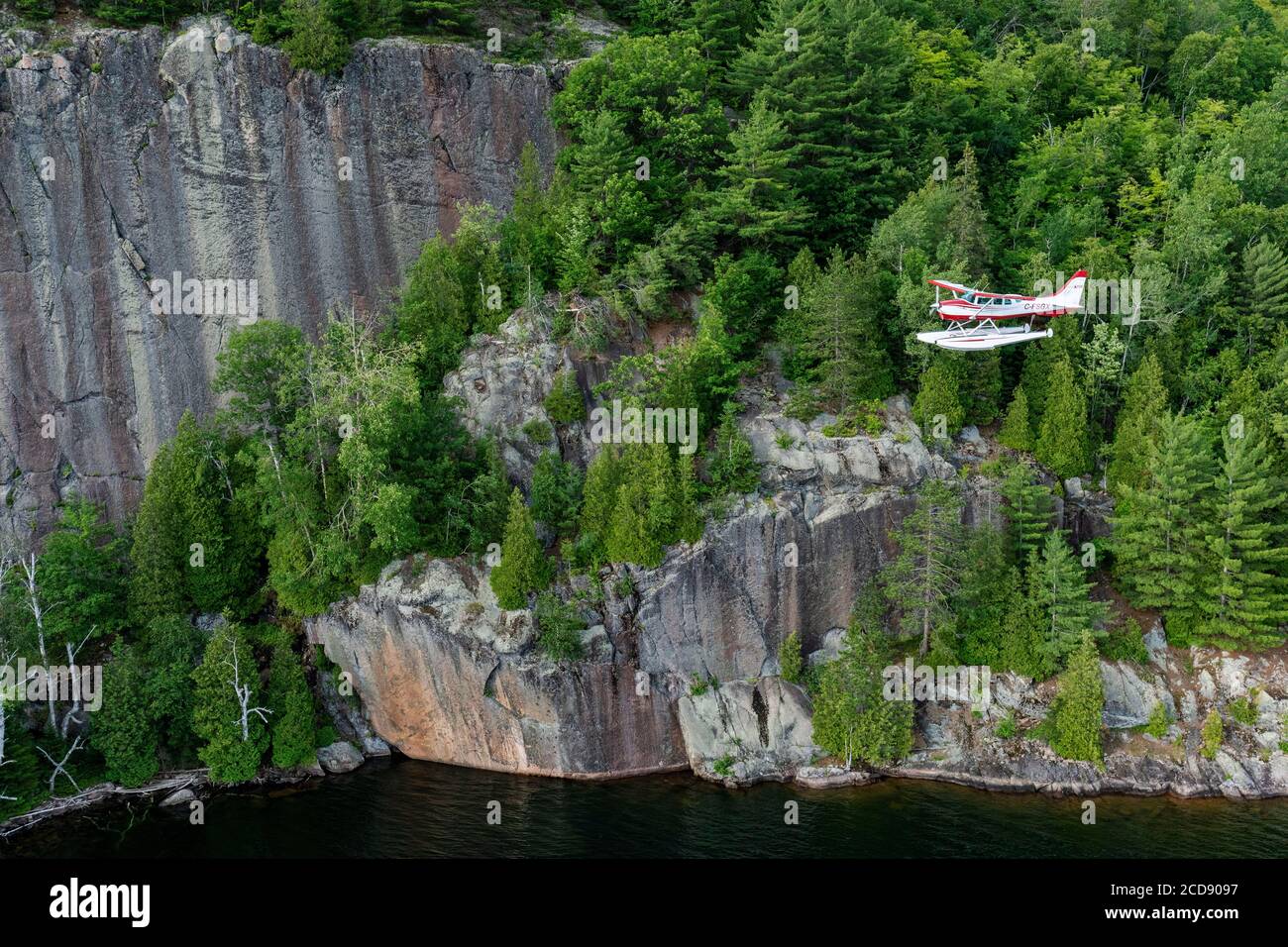 Canada, Province of Quebec, Mauricie Region, Hydravion Aventure, Cessna 206 flight over the boreal forest in the vicinity of Lac Sacacomie Stock Photo
