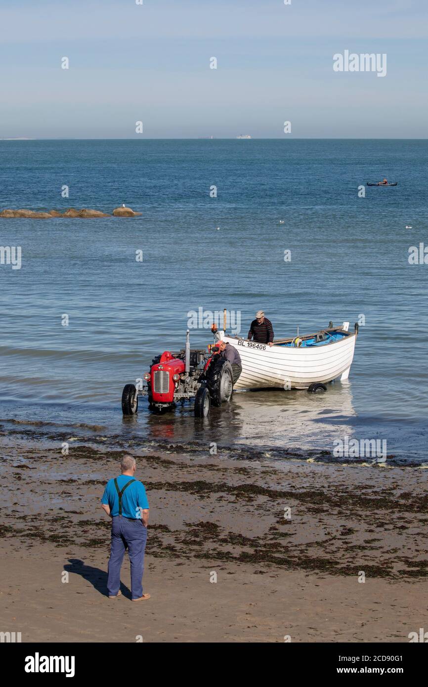 France, Pas de Calais, Audinghen, Cap Gris Nez, flobart pulled by a tractor on the beach Stock Photo