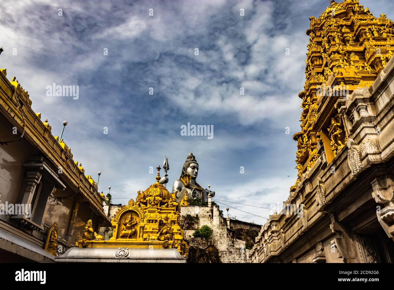 shiva statue isolated at murdeshwar temple from unique angle image is