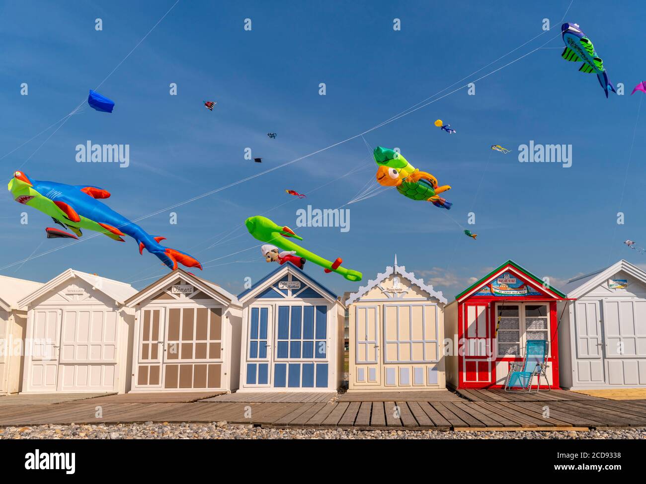 France, Somme, Bay of the Somme, Cayeux-sur-mer, The kite festival which takes place once a year on the pebble dike and the path of the boards lined with beach cabins Stock Photo