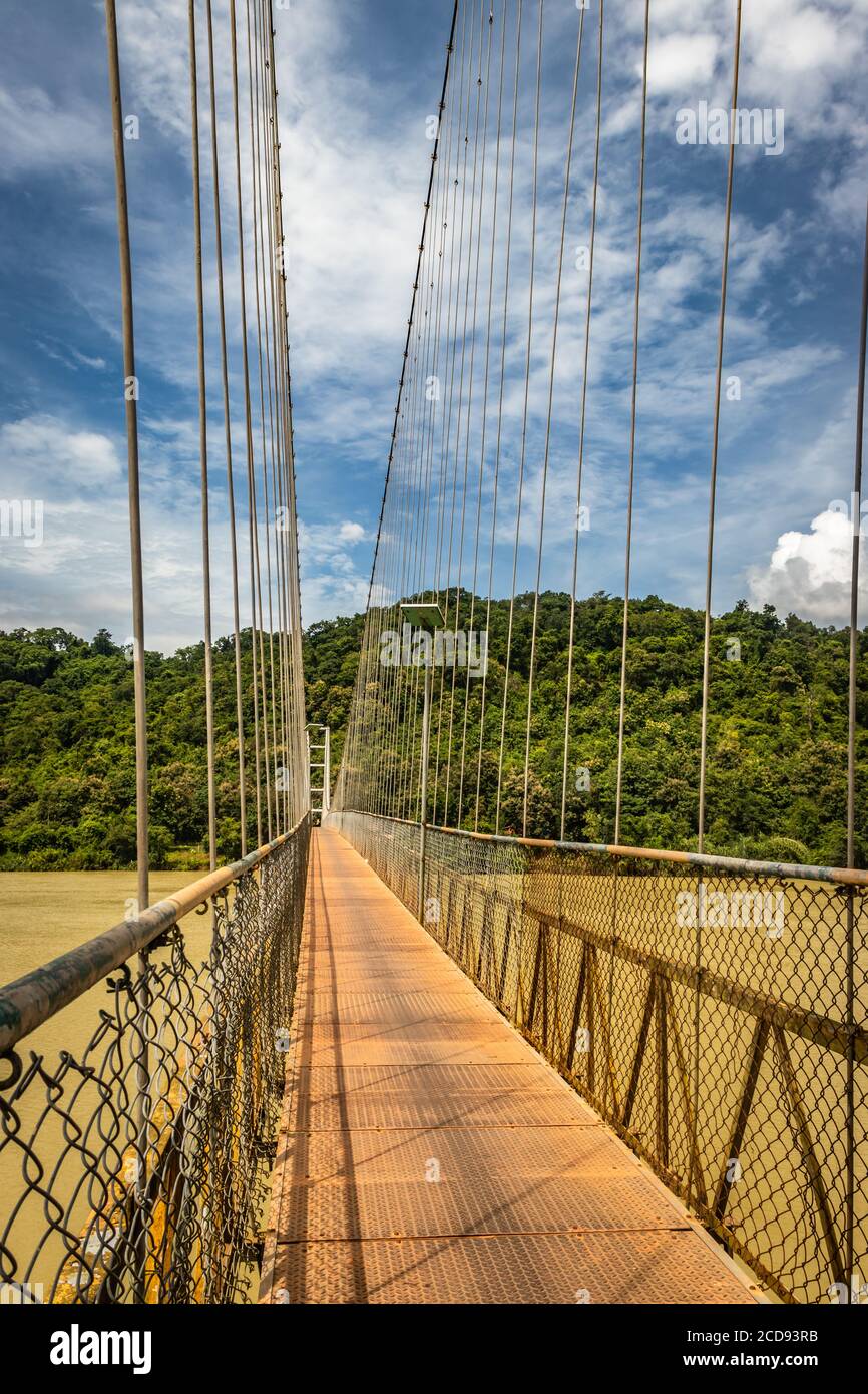 suspension iron cable bridge isolated with bright blue sky from unique different angle image is taken at honnavar karnataka india. it is the fine exam Stock Photo