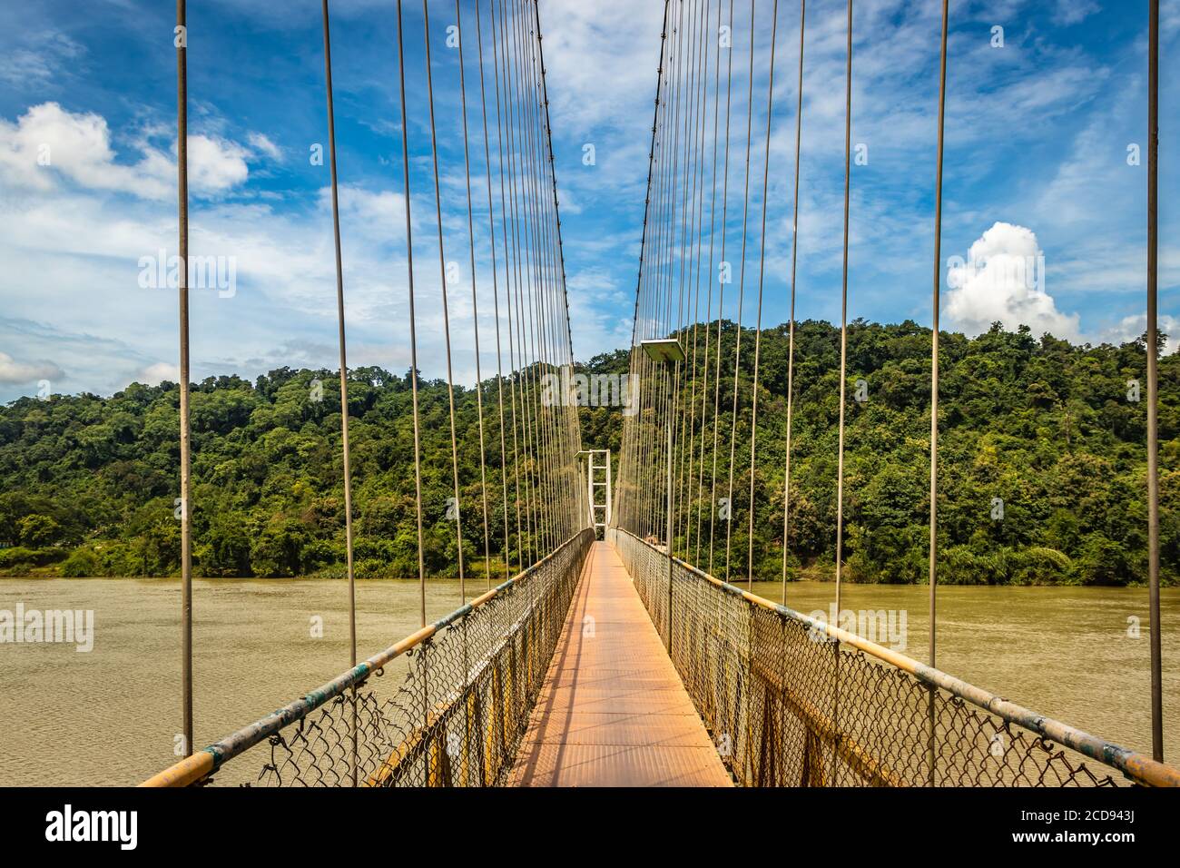 suspension iron cable bridge isolated with bright blue sky from unique different angle image is taken at honnavar karnataka india. it is the fine exam Stock Photo