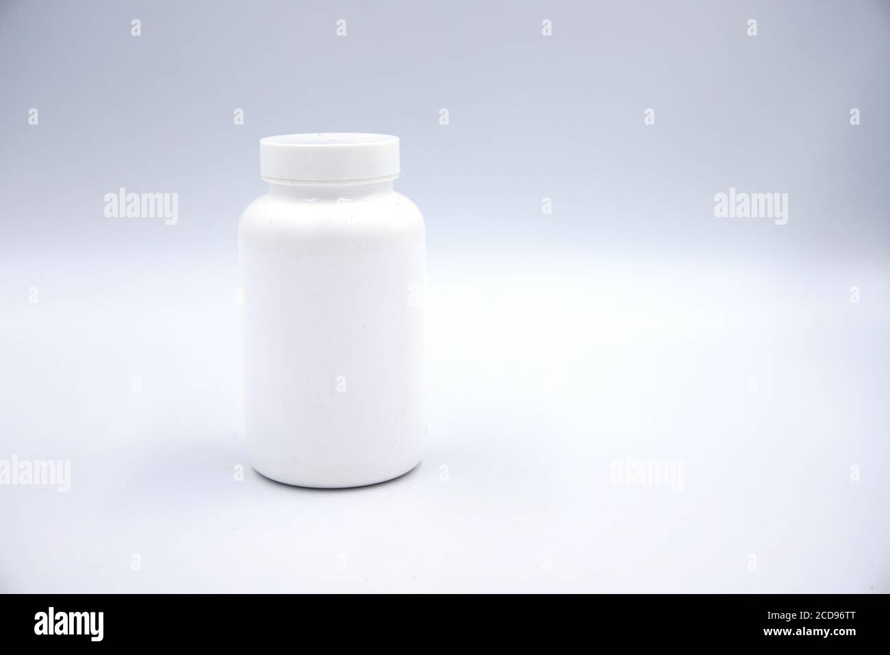 Download White Plastic Bottle For Pills Or Food Supplement Studio Photo On White Background Round Pharmacologic Container Mockup Pill Or Drug Jar Blank Packa Stock Photo Alamy PSD Mockup Templates