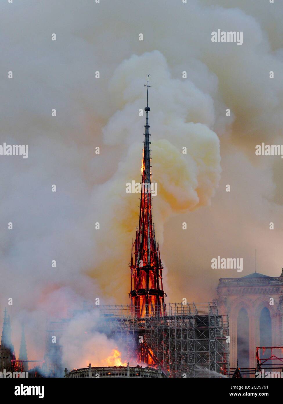 [ Unpublished - Exclusive ] France, Paris, area listed as World Heritage by UNESCO, Notre Dame Cathedral of 14th century Gothic architecture during the fire of 15th April 2019, close-up on the incandescent frame of the spire before his impending downfall Stock Photo
