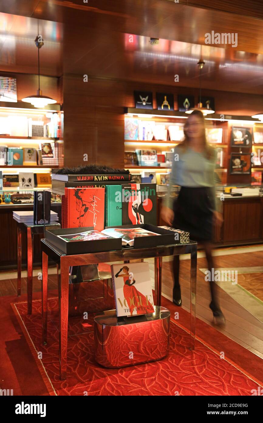 France, Paris, Royal Monceau hotel, woman in the hotel bookstore of the hotel Stock Photo