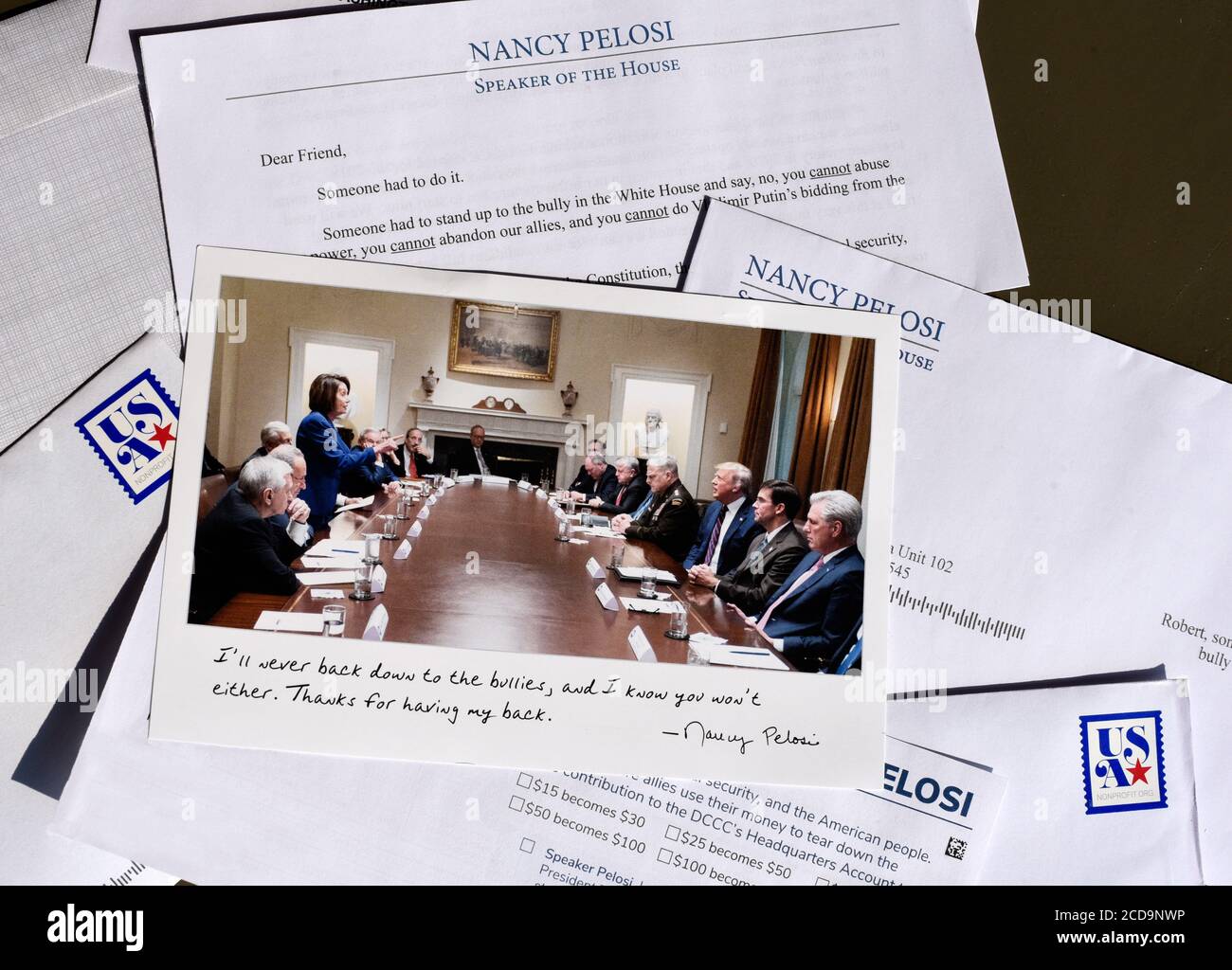 A request for contributions sent to Democrats by Speaker of the House Nancy Pelosi and the DCCC with a photograph of her challenging President Trump. Stock Photo