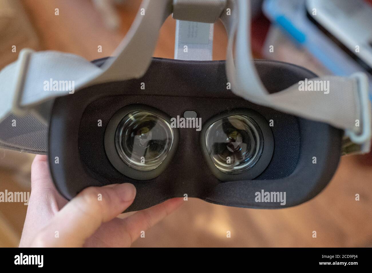 High angle view looking down into the eyepiece of an Oculus Go virtual reality headset, as if in process of putting headset on, San Ramon, California, June 18, 2020. () Stock Photo