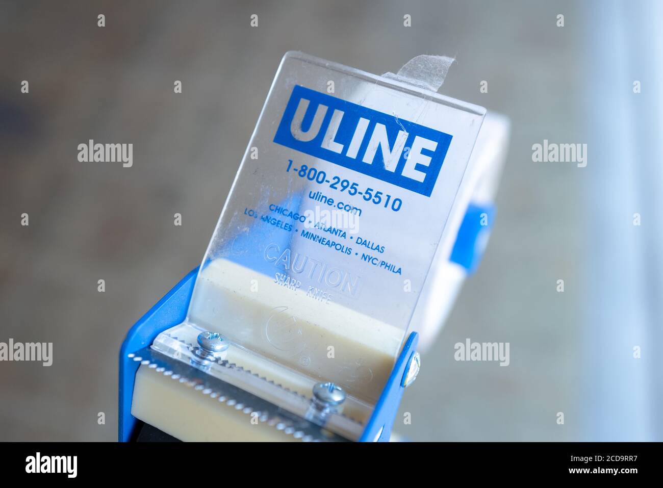 Close-up of logo for shipping and logistics supply company Uline on packing tape dispenser, San Ramon, California, June 18, 2020. () Stock Photo