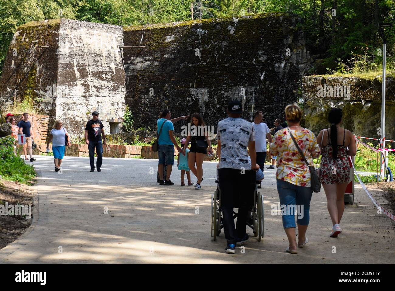 Gierloz, Poland. 22nd Aug, 2020. Visitors walk by a destroyed bunker part of the historical Wolf's Lair, the first Hitler' military headquarters on the Eastern front with the objective to start of the Soviet Union, in Gierloz.The famous Wolf's Lair was one of the top secrets headquarters of Nazi Germany located on nowadays Eastern Poland. The Nazi site is famous for the assassination attempt on Adolf's Hitler life known as Operation Valkyrie, Claus von Stauffenberg and others targeted Hitler with a suitcase bomb during a meeting inside the Wolf's Lair. (Credit Image: © Omar Marques/SOPA Im Stock Photo