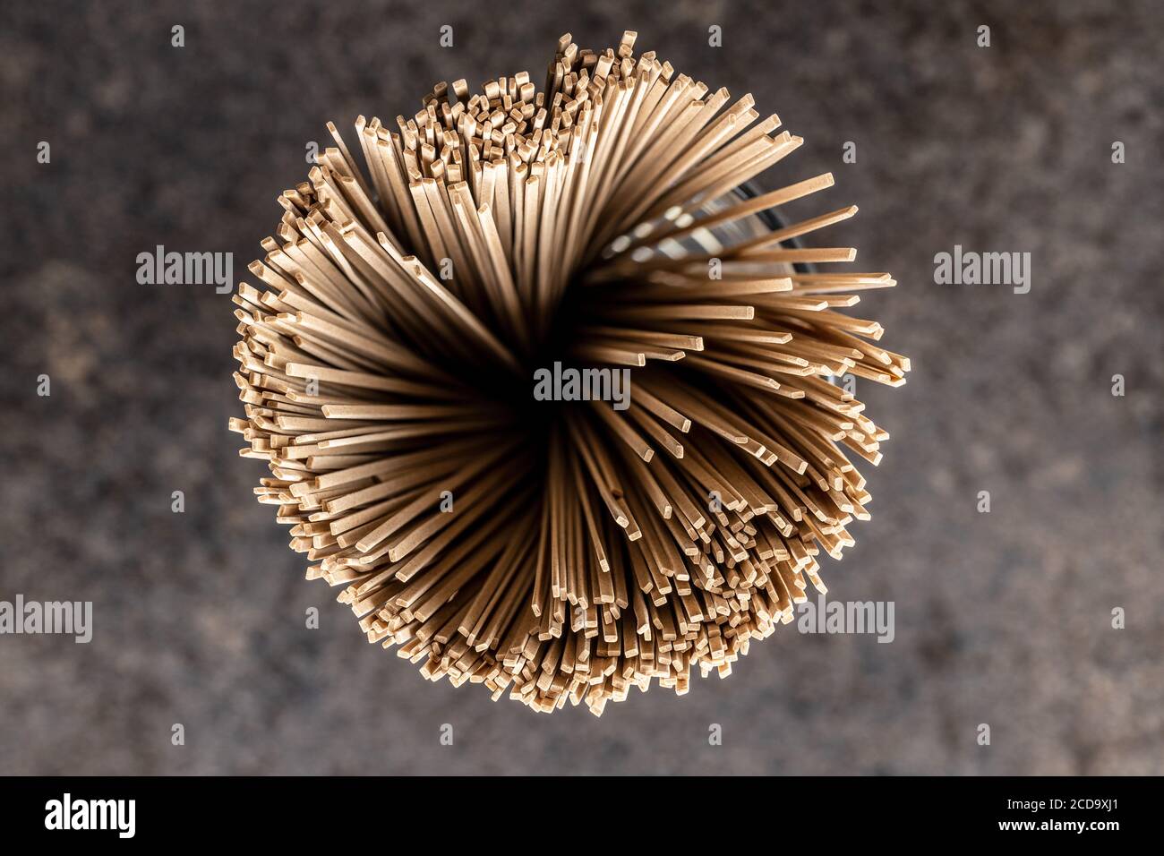 Uncooked soba noodles. Traditional Japanese noodles. Top view. Stock Photo